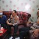 Pejabat utama Polres Metro Depok mengunjungi anggota yang sakit dalam kegiatan anjangsana Bhayangkara ke-79