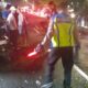 Polisi melakukan olah TKP tabrak lari yang menewaskan pengendara motor WK di Jalan Raya Bogor, Depok
